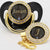 Gold Black Pacifiers